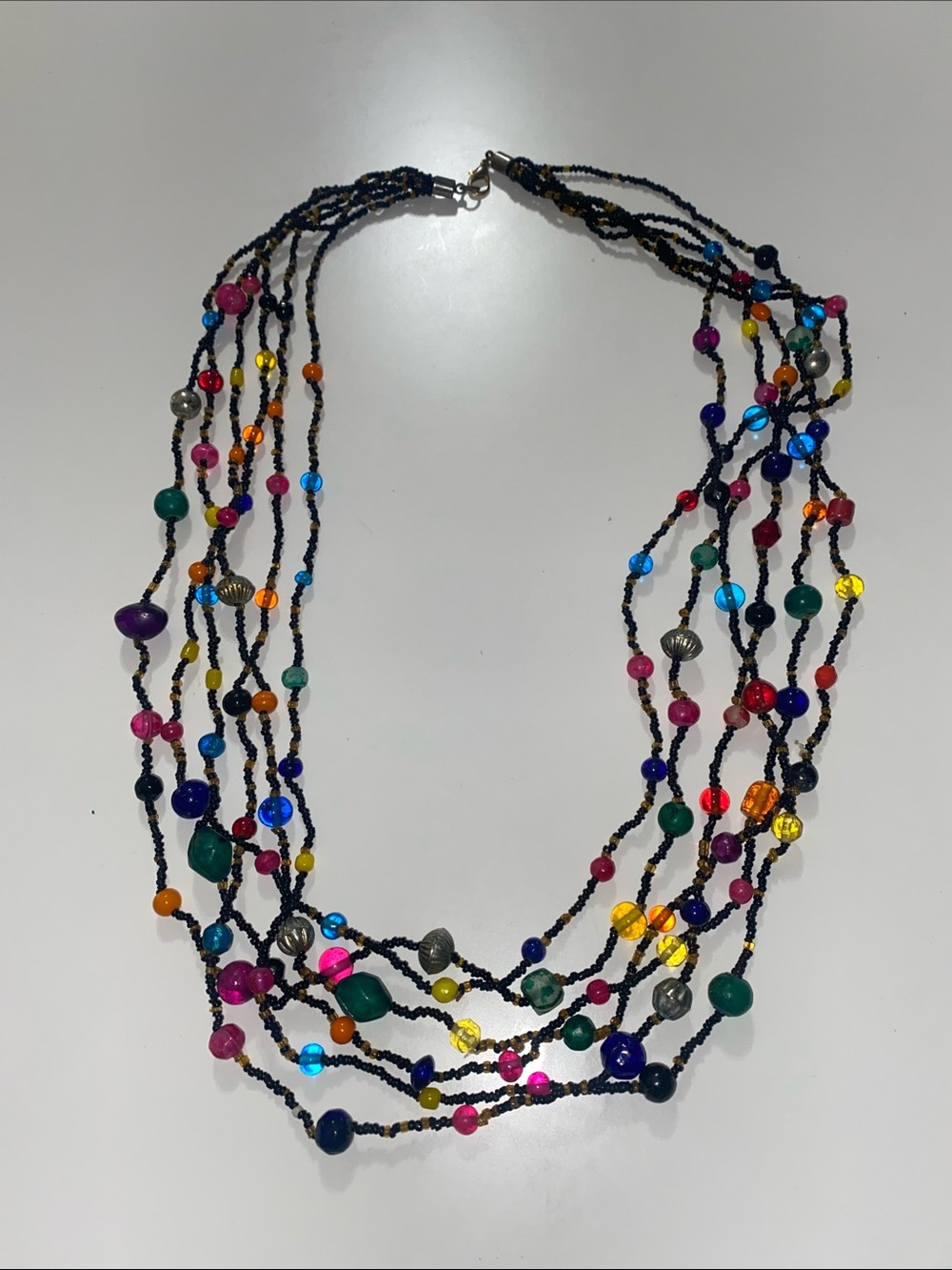 Multi-Strand Black Beaded Necklace with Colorful Beaded Accents